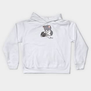 Kitten playing with yarn Kids Hoodie